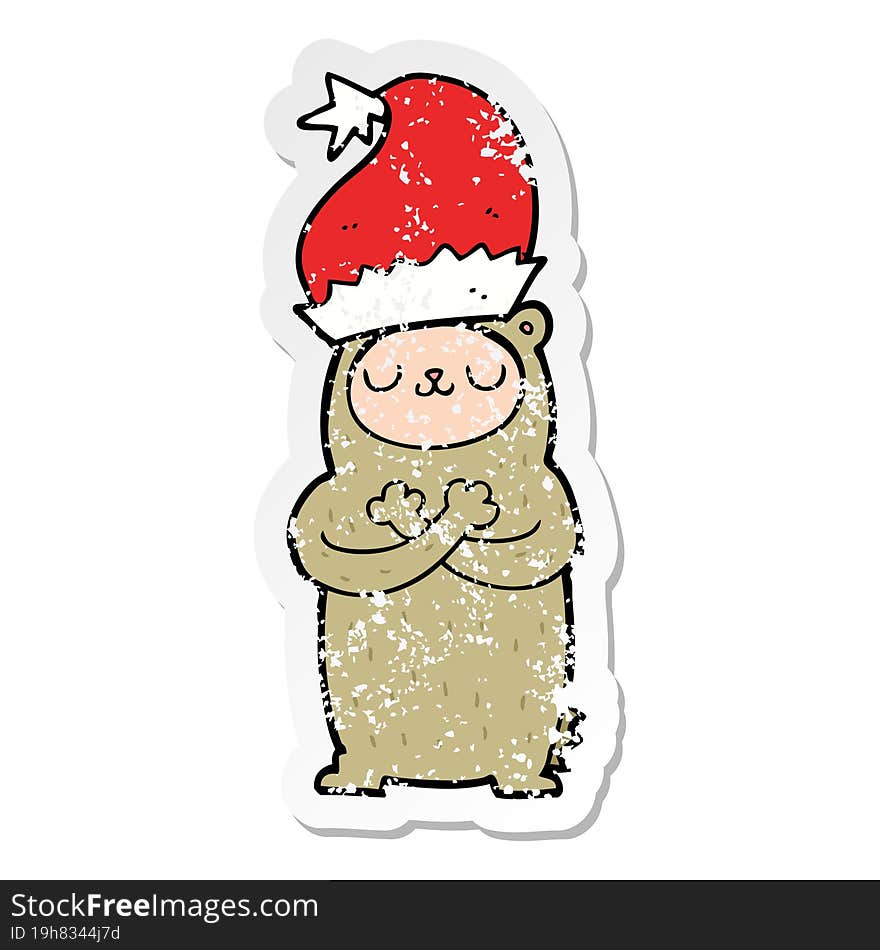 distressed sticker of a cartoon bear wearing christmas hat