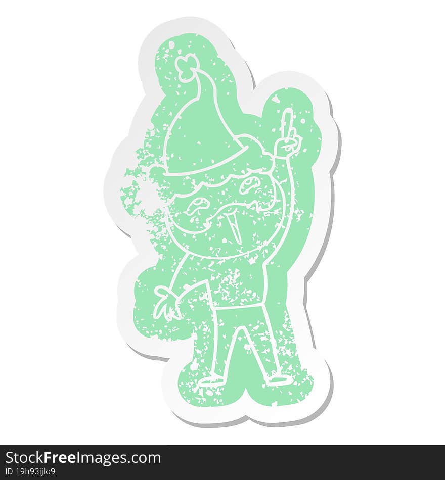 cartoon distressed sticker of a happy bearded man wearing santa hat