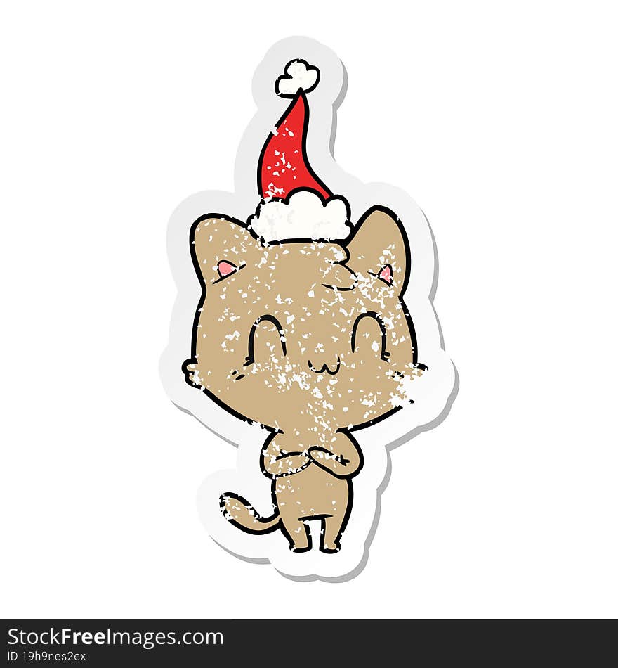 Distressed Sticker Cartoon Of A Happy Cat Wearing Santa Hat