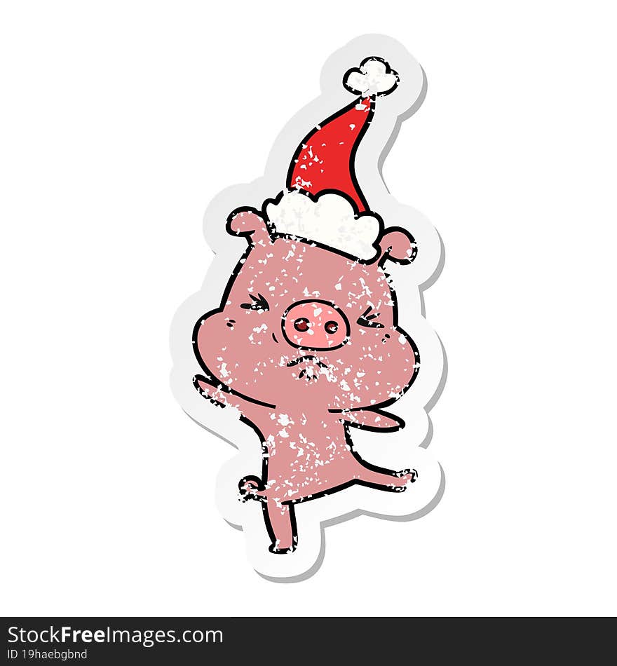 distressed sticker cartoon of a furious pig wearing santa hat