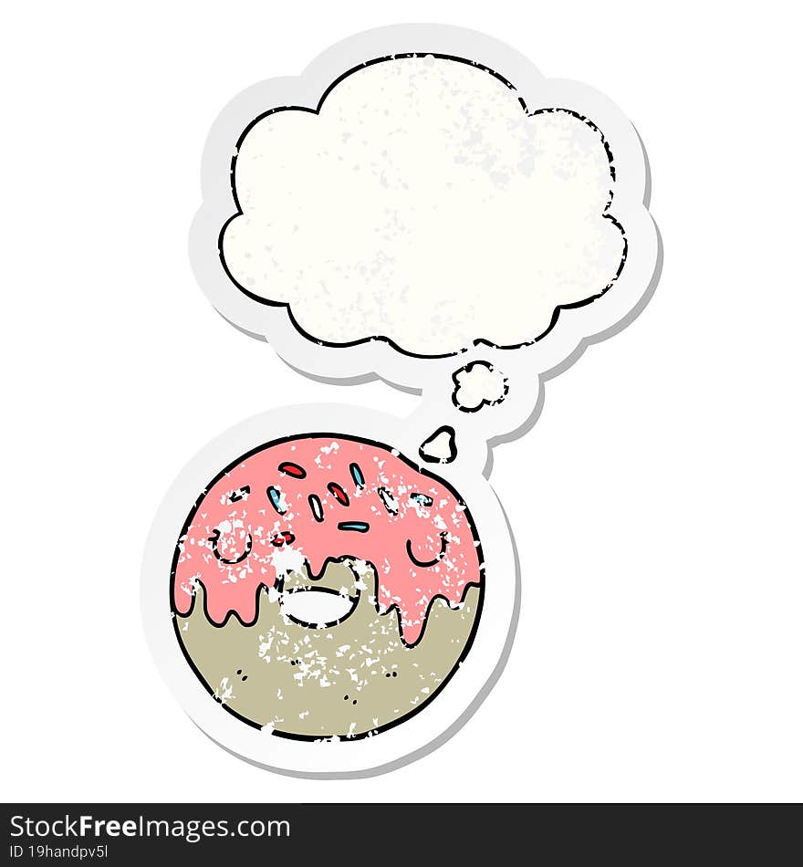 cartoon donut and thought bubble as a distressed worn sticker