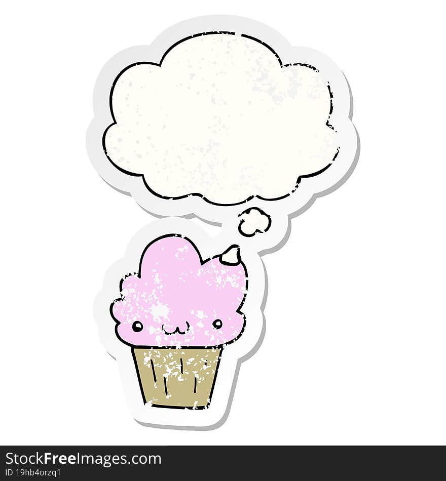 cartoon cupcake with face and thought bubble as a distressed worn sticker