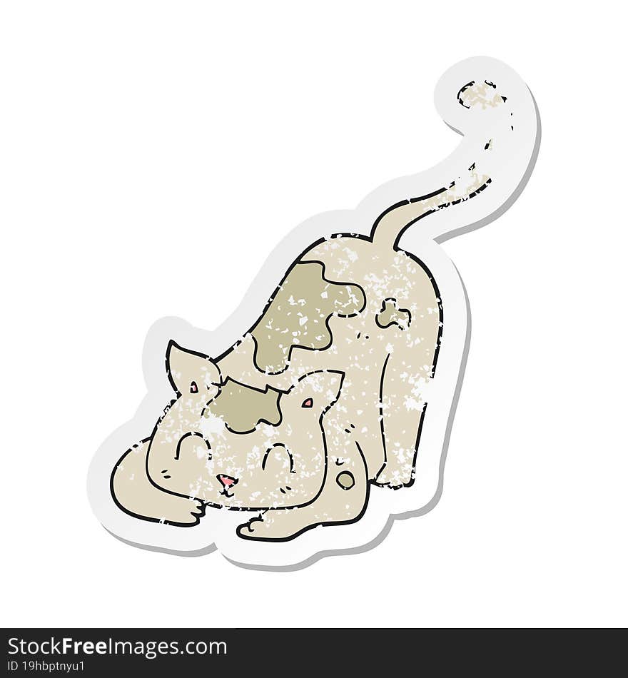 retro distressed sticker of a cartoon cat playing