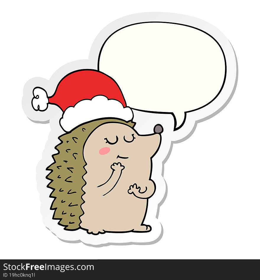 cartoon hedgehog wearing christmas hat and speech bubble sticker