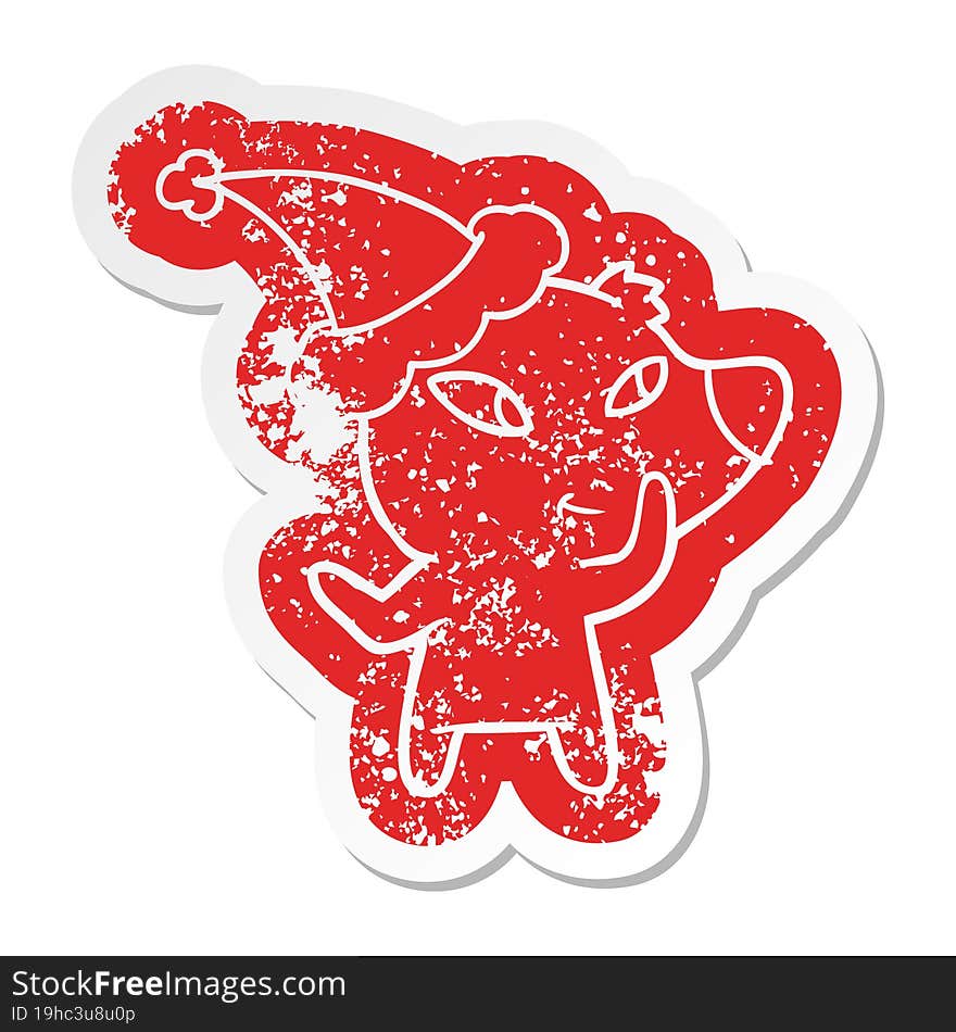 cute cartoon distressed sticker of a bear wearing santa hat