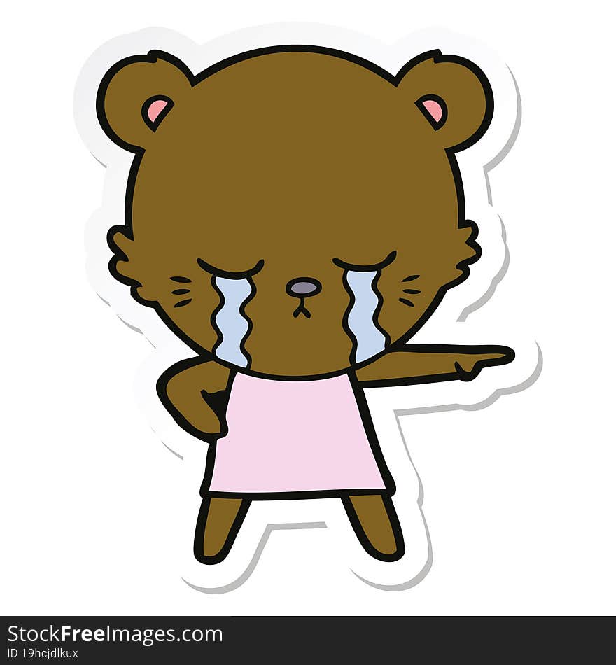 crying cartoon bear in dress pointing