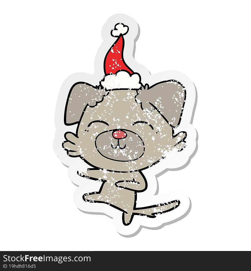 distressed sticker cartoon of a dog kicking wearing santa hat