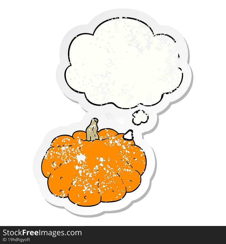 cartoon pumpkin and thought bubble as a distressed worn sticker