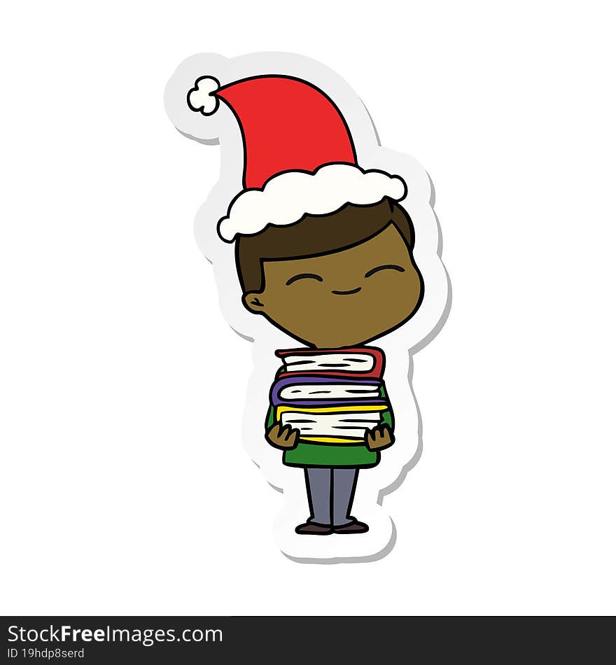 Sticker Cartoon Of A Smiling Boy With Stack Of Books Wearing Santa Hat