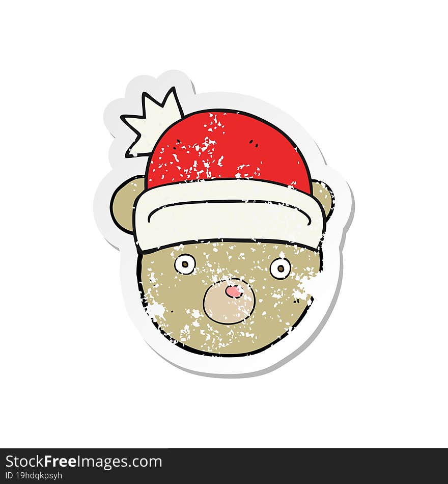 retro distressed sticker of a cartoon teddy bear wearing christmas hat