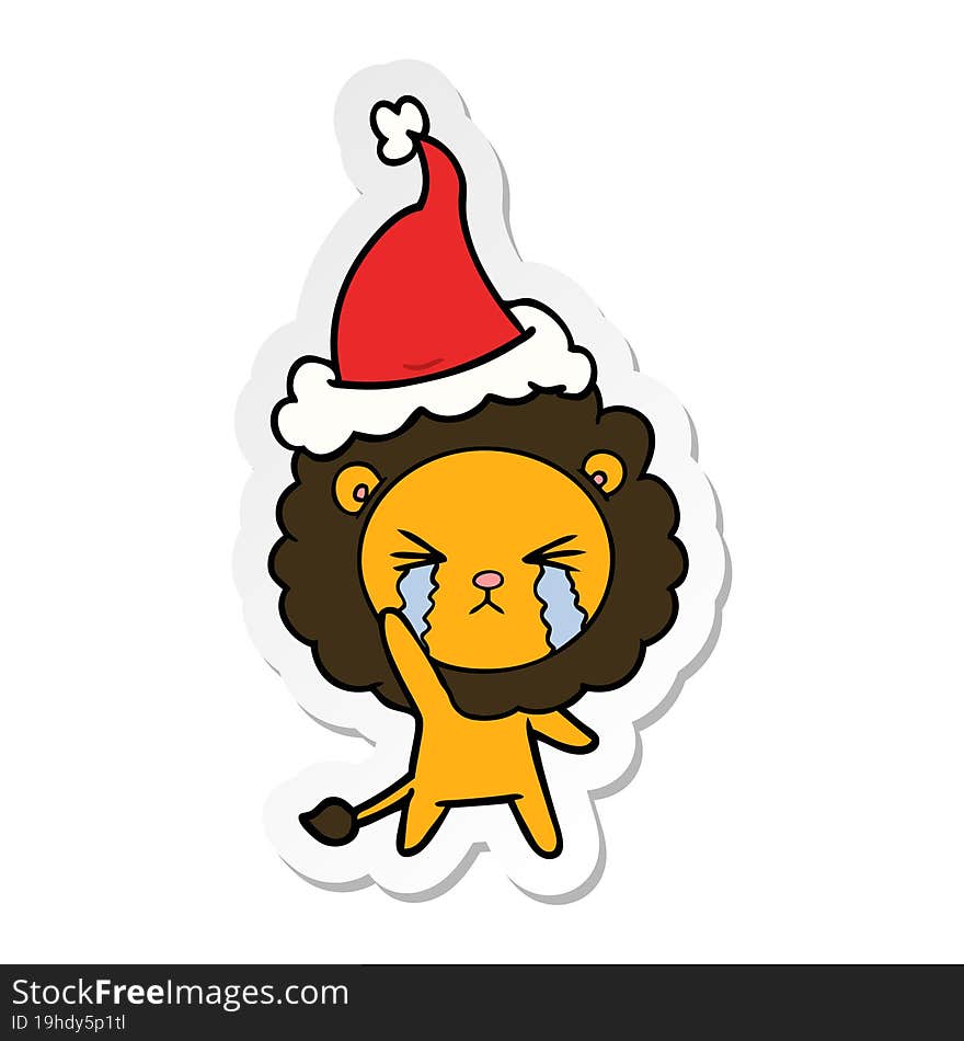 sticker cartoon of a crying lion wearing santa hat