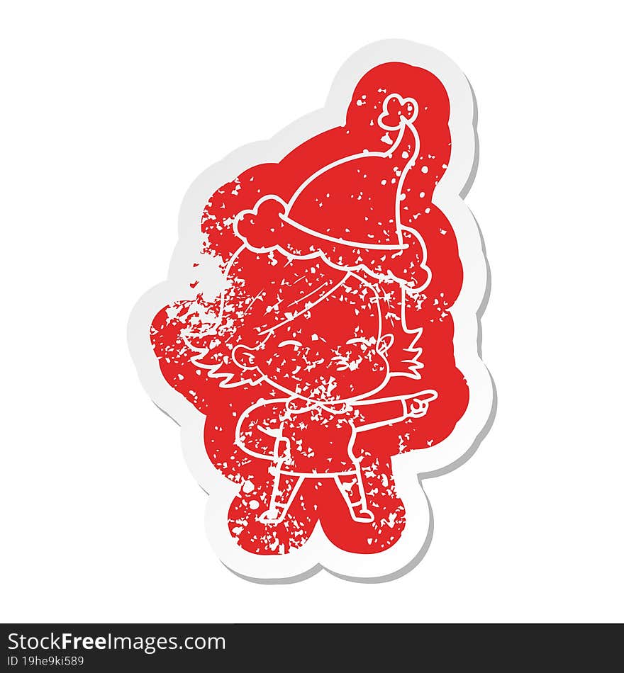 cartoon distressed sticker of a woman pointing wearing santa hat