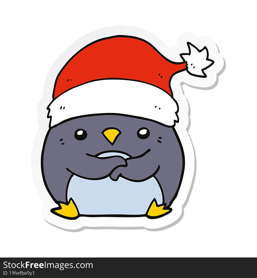 sticker of a cute cartoon penguin wearing christmas hat