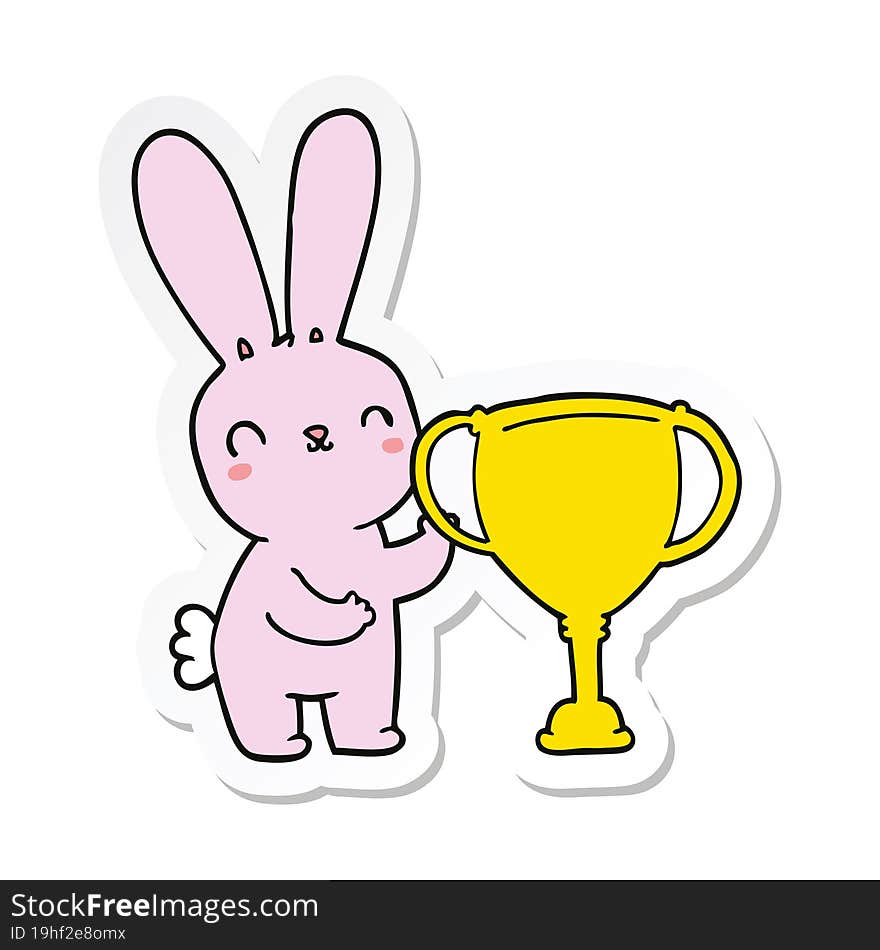 sticker of a cute cartoon rabbit with sports trophy cup