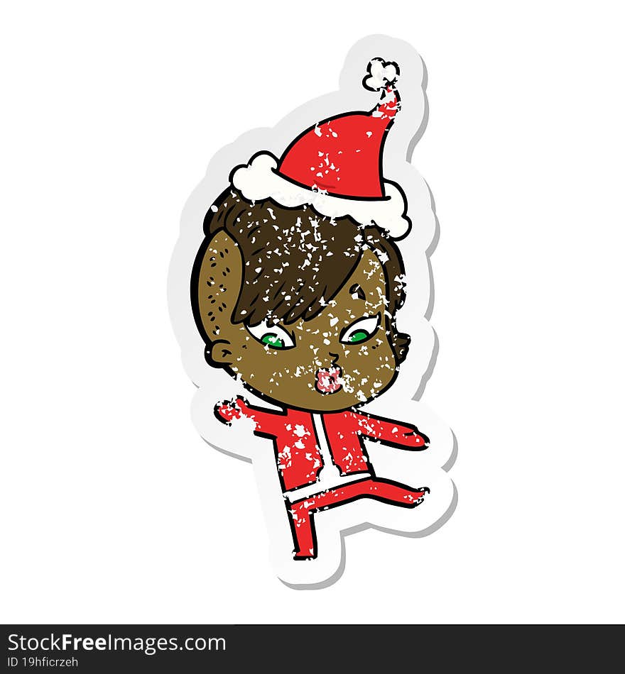 distressed sticker cartoon of a surprised girl in science fiction clothes wearing santa hat