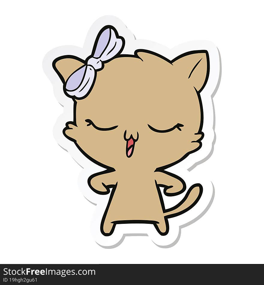 sticker of a cartoon cat with bow on head