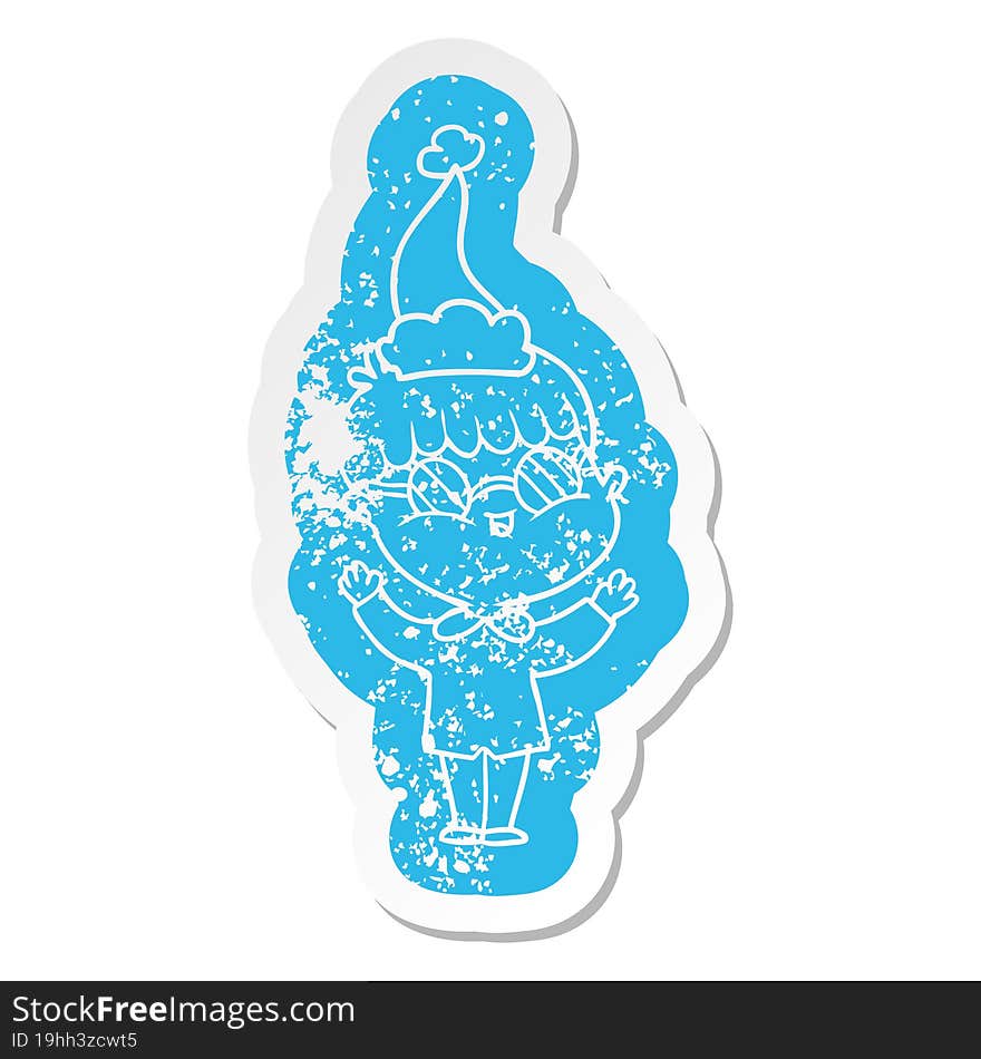 quirky cartoon distressed sticker of a boy wearing spectacles wearing santa hat