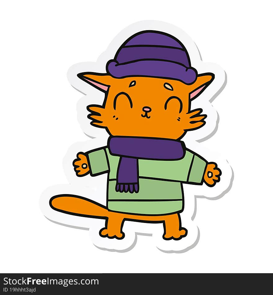 sticker of a cartoon cat in winter clothes