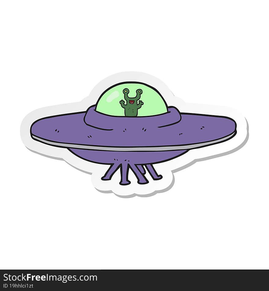 sticker of a cartoon alien spaceship