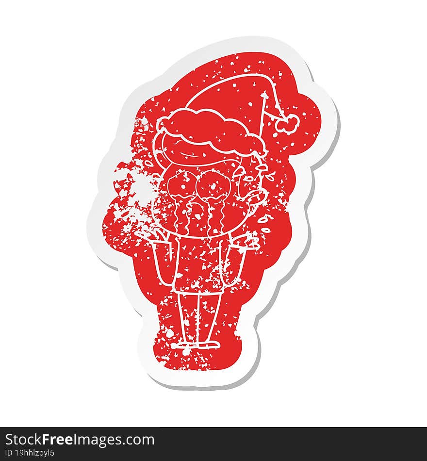 cartoon distressed sticker of a crying man wearing santa hat