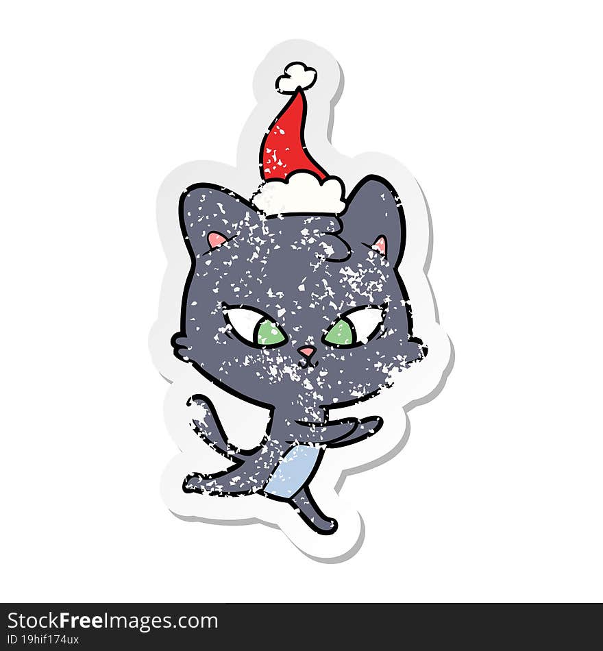 Cute Distressed Sticker Cartoon Of A Cat Wearing Santa Hat