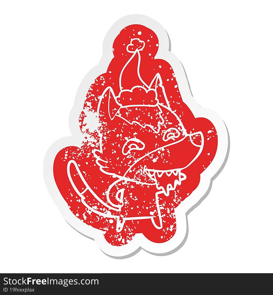 cartoon distressed sticker of a hungry wolf wearing santa hat