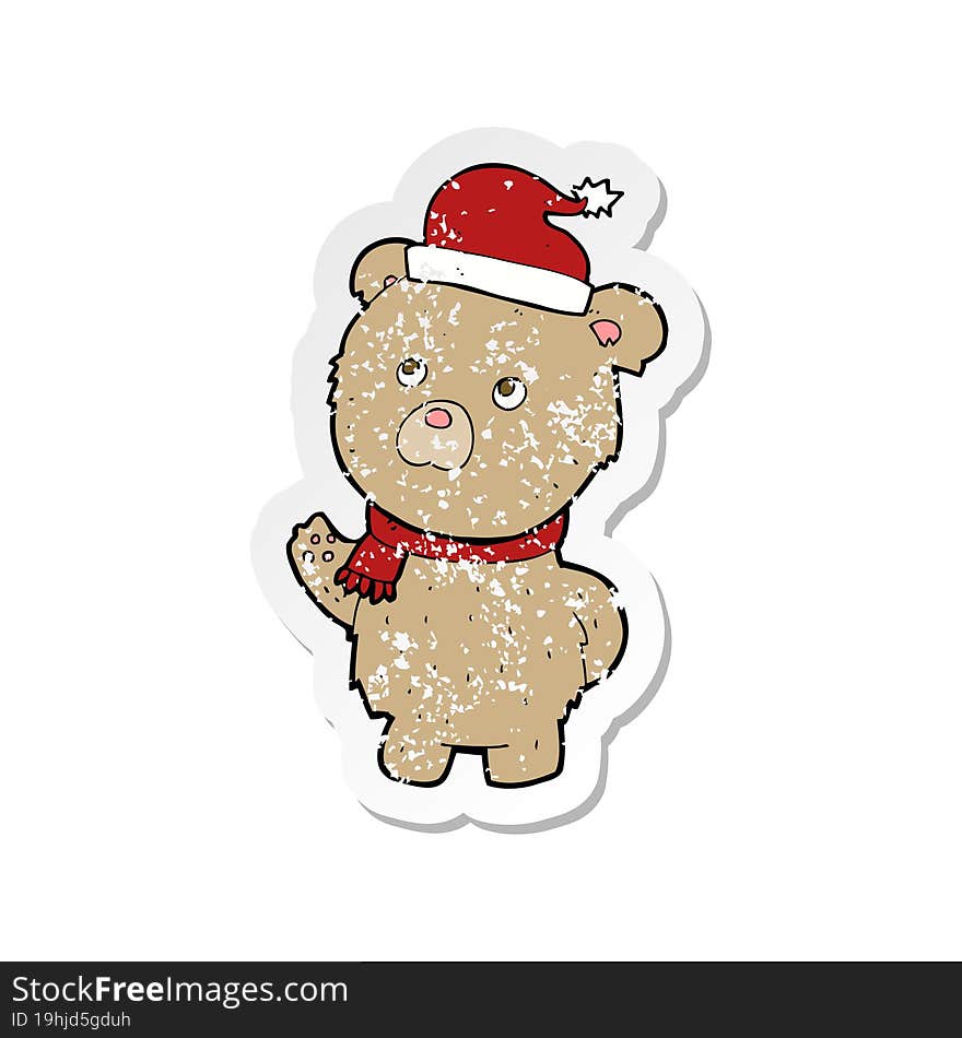 retro distressed sticker of a cartoon christmas teddy bear