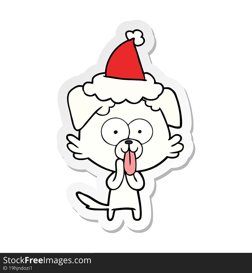 sticker cartoon of a dog with tongue sticking out wearing santa hat