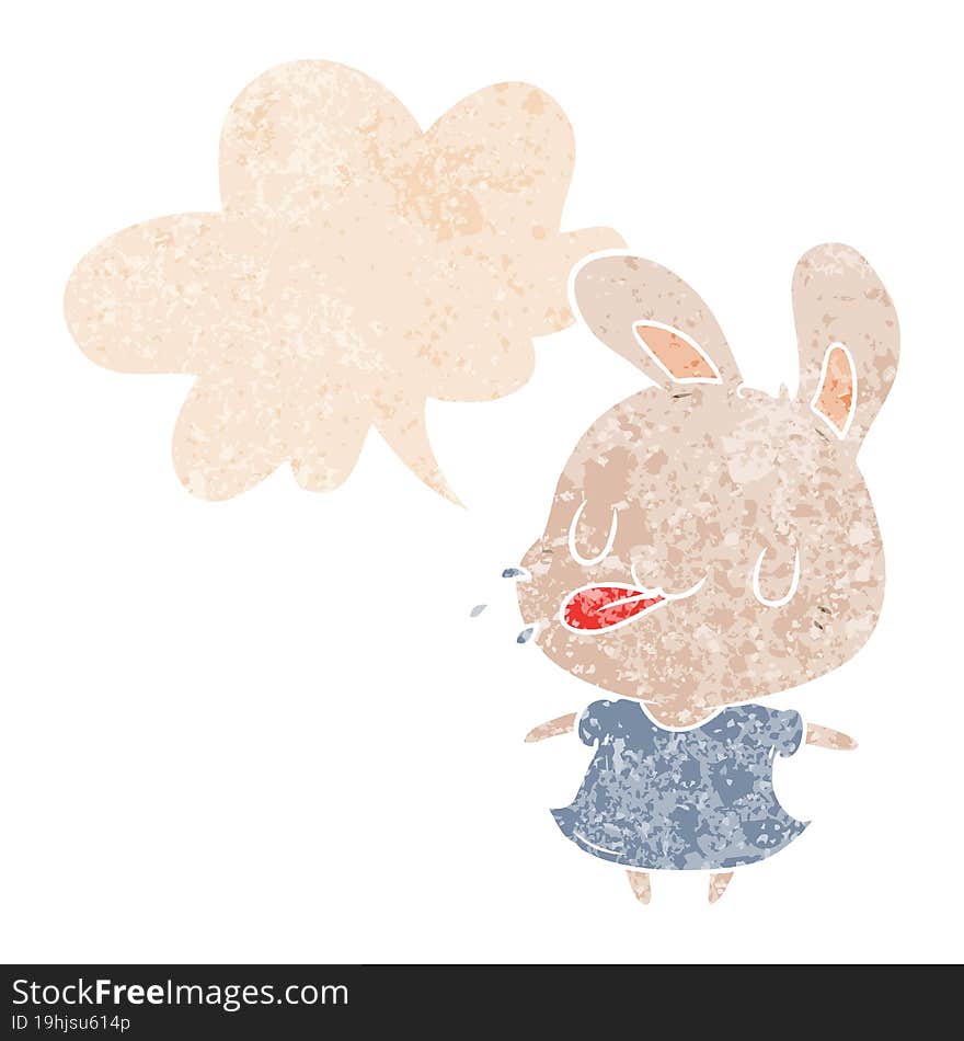 cartoon rabbit and speech bubble in retro textured style