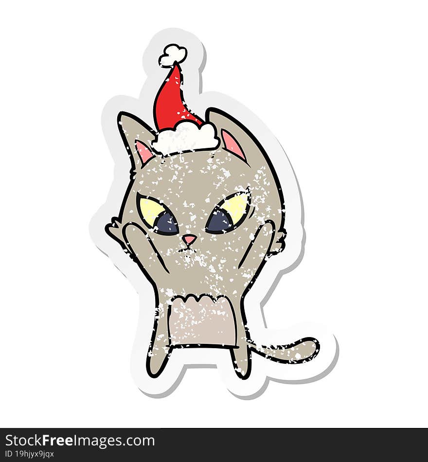 confused distressed sticker cartoon of a cat wearing santa hat