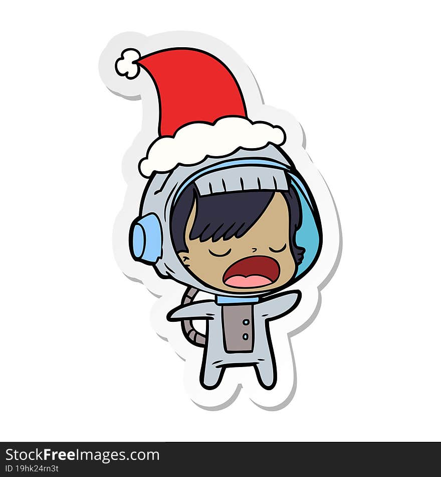 sticker cartoon of a talking astronaut woman wearing santa hat