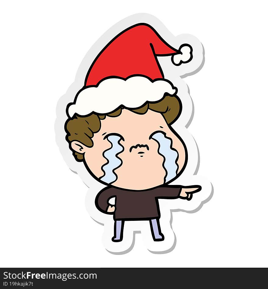 sticker cartoon of a man crying wearing santa hat