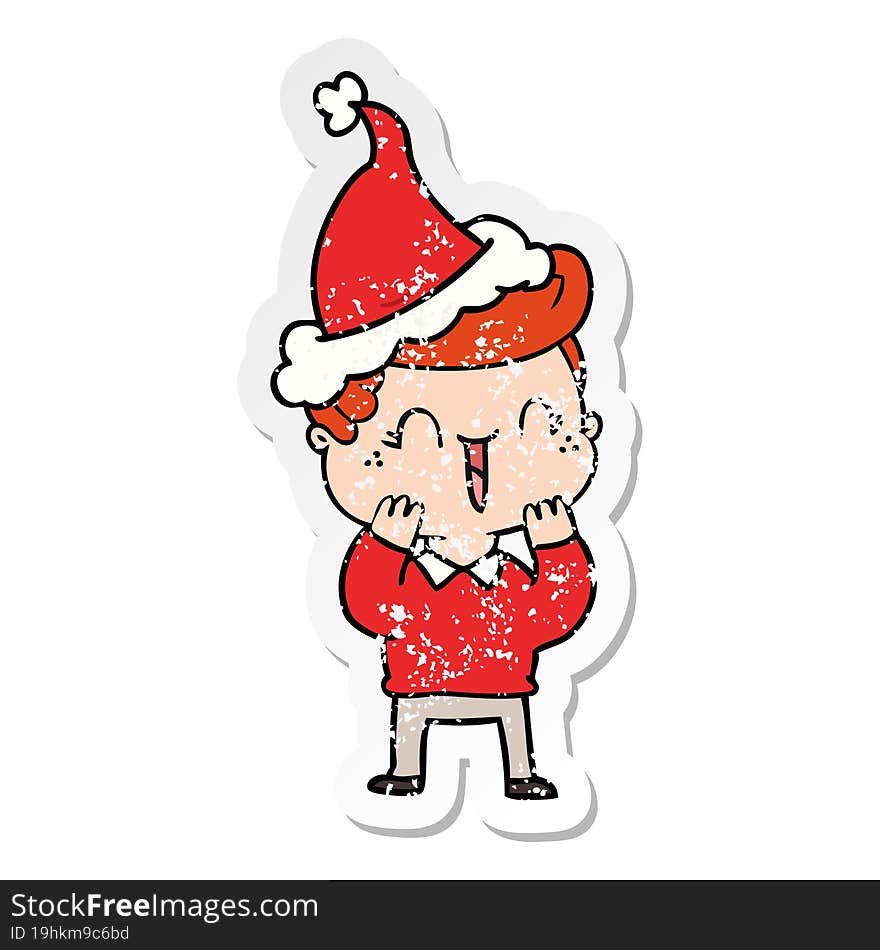 distressed sticker cartoon of a laughing boy wearing santa hat