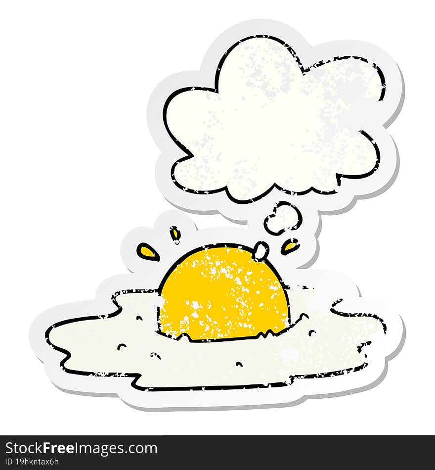 cartoon fried egg with thought bubble as a distressed worn sticker