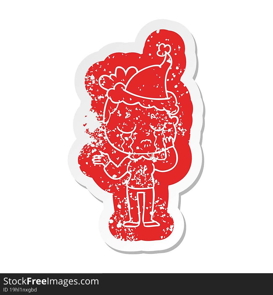 cartoon distressed sticker of a crying woman wearing santa hat