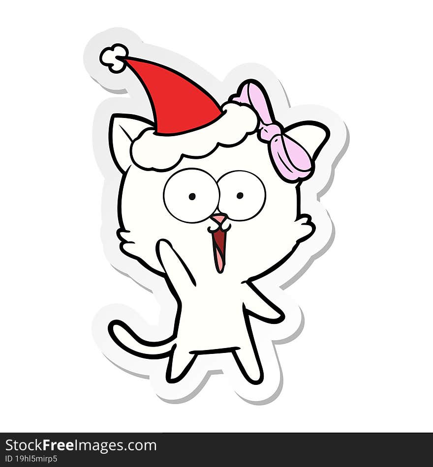 sticker cartoon of a cat wearing santa hat