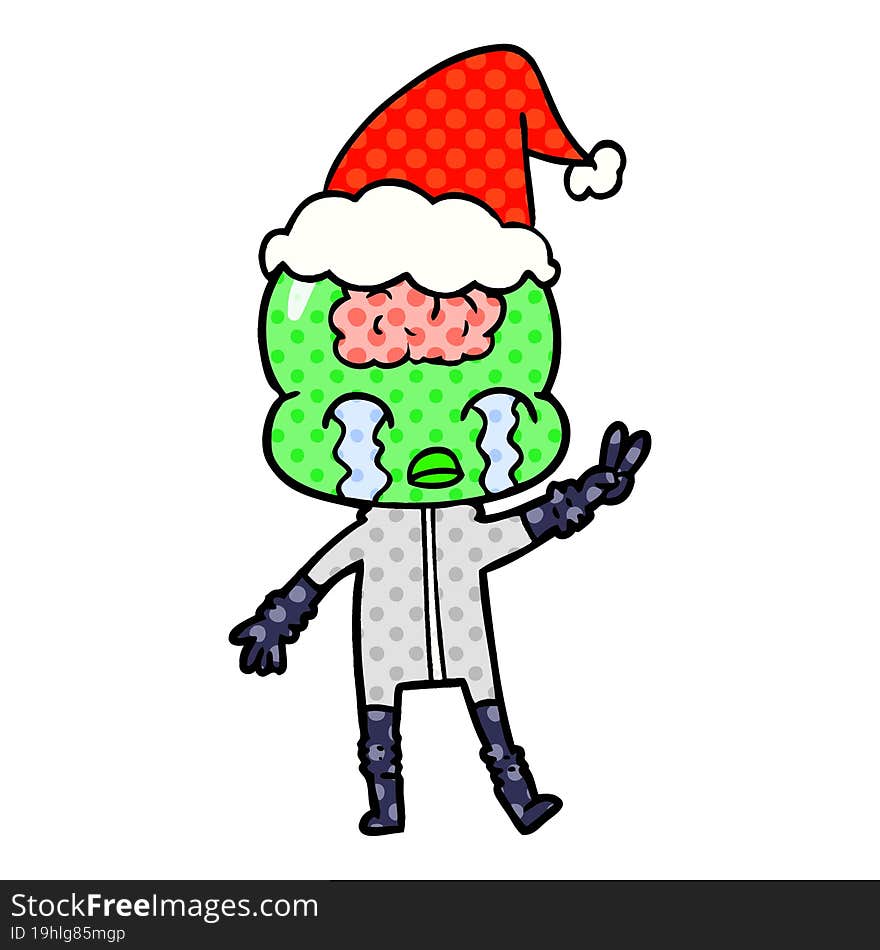 hand drawn comic book style illustration of a big brain alien crying and giving peace sign wearing santa hat