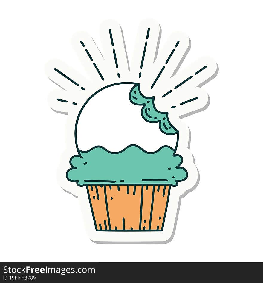 sticker of a tattoo style cupcake with missing bite