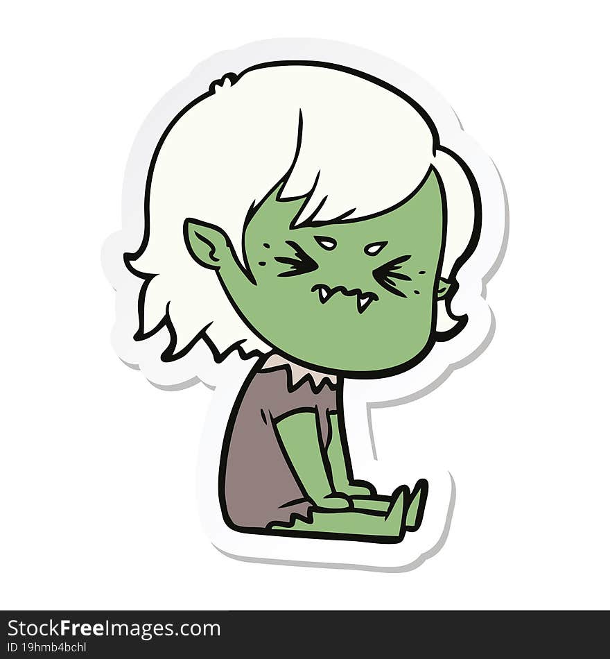 sticker of a annoyed cartoon vampire girl