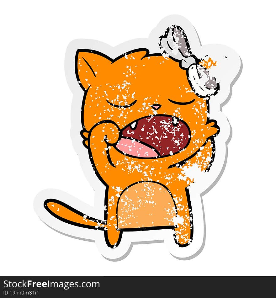 distressed sticker of a cartoon yawning cat