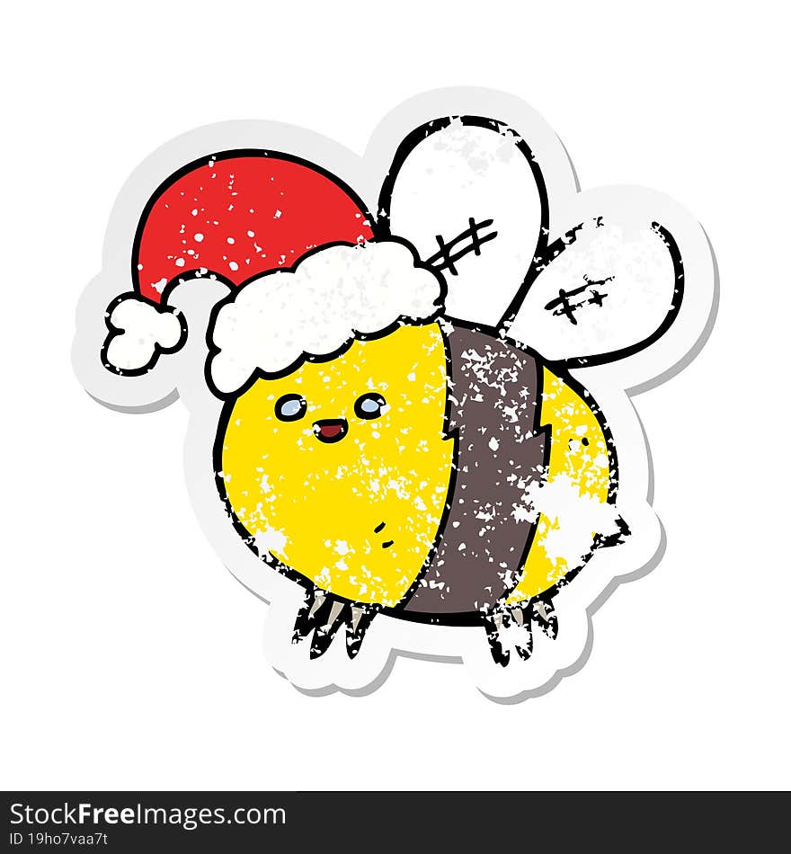 distressed sticker of a cute cartoon bee wearing christmas hat