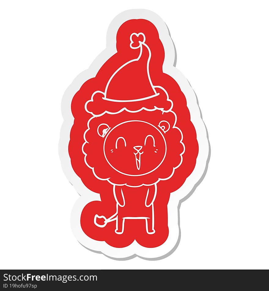 laughing lion cartoon  sticker of a wearing santa hat