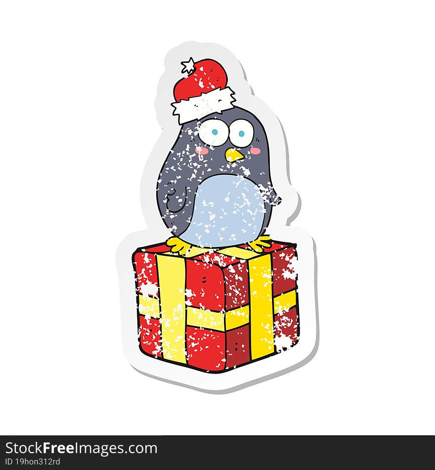 retro distressed sticker of a cartoon christmas penguin