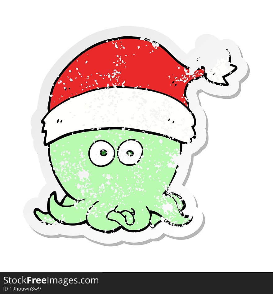 distressed sticker of a cartoon octopus wearing christmas hat