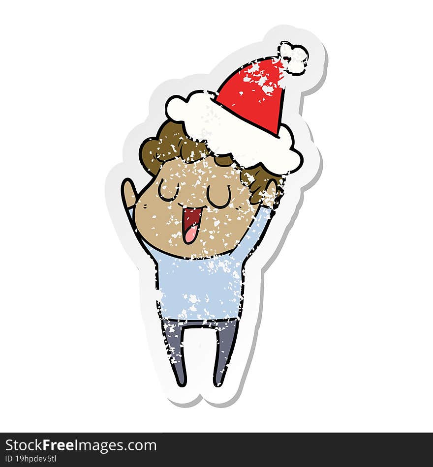 laughing distressed sticker cartoon of a man wearing santa hat