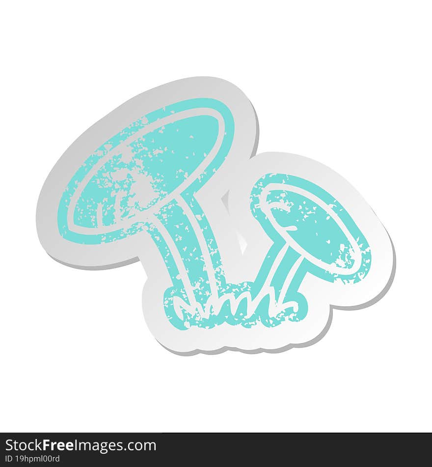 distressed old sticker of some mushrooms