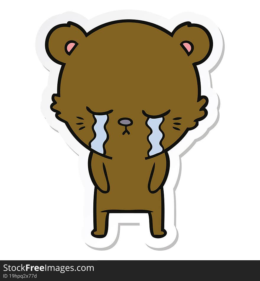 sticker of a crying cartoon bear