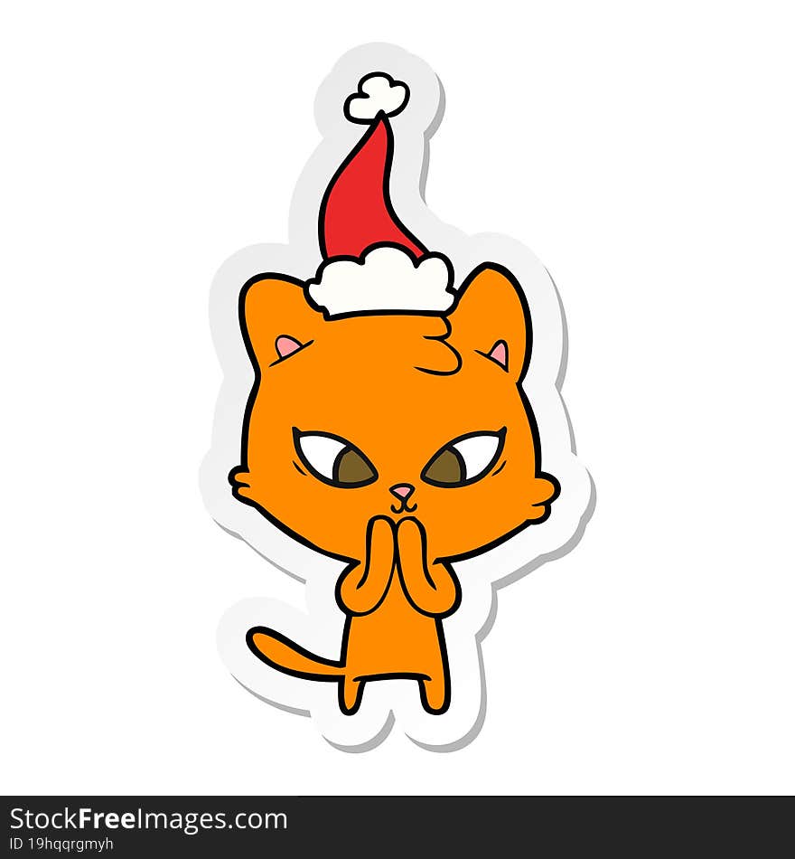 cute sticker cartoon of a cat wearing santa hat