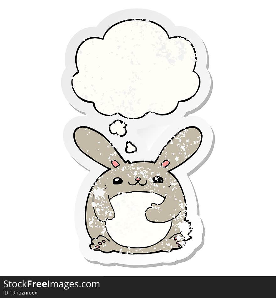 cartoon rabbit and thought bubble as a distressed worn sticker