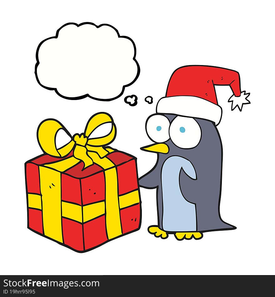 freehand drawn thought bubble cartoon christmas penguin with present